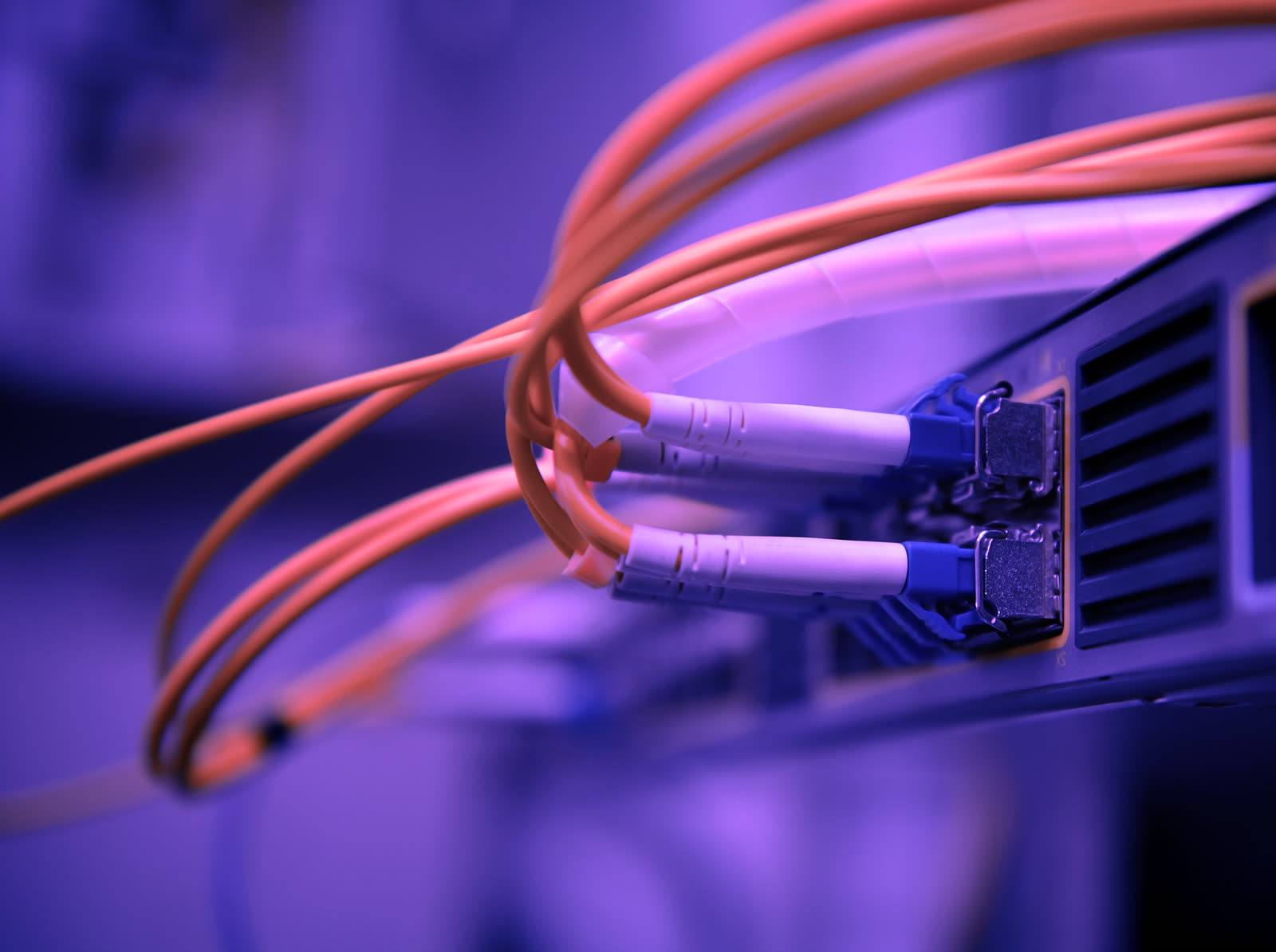 Orange cables in a network panel